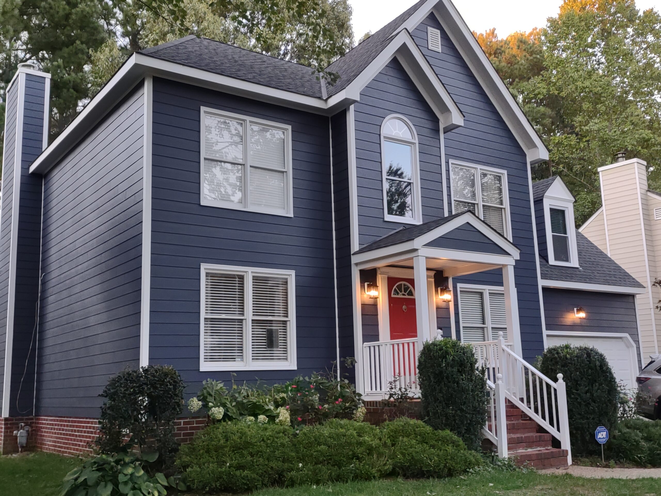 James Hardie siding contractor Richmond VA installing fiber cement siding on residential home