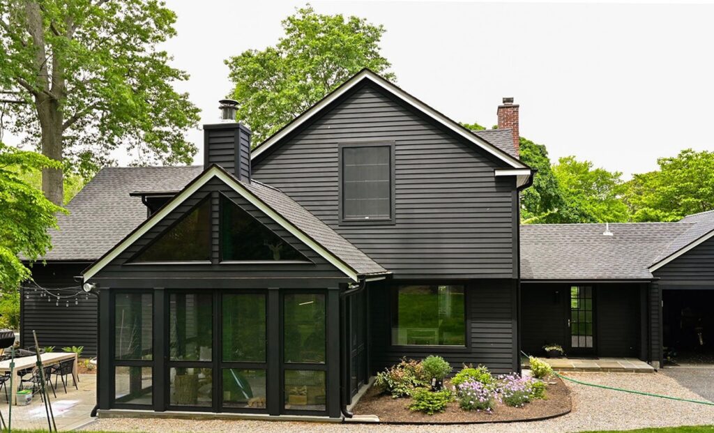 Roofing contractor in Spotsylvania County installing asphalt shingle roof on residential home